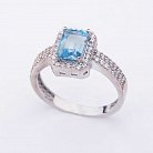 Золотое кольцо с голубым топазом и фианитами к04633 от ювелирного магазина Оникс
