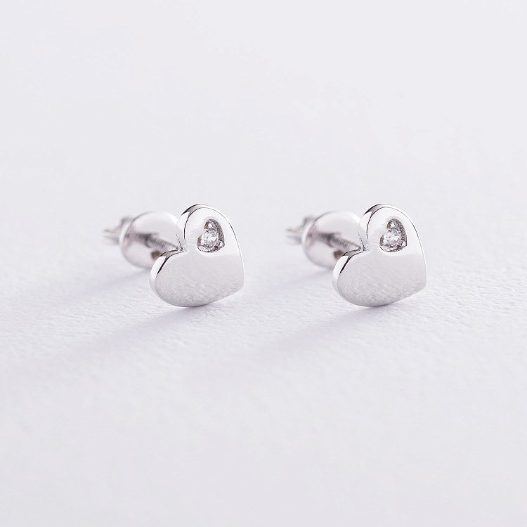 Золоті сережки "Сердечка" з фіанітами с06722 від ювелірного магазину Онікс