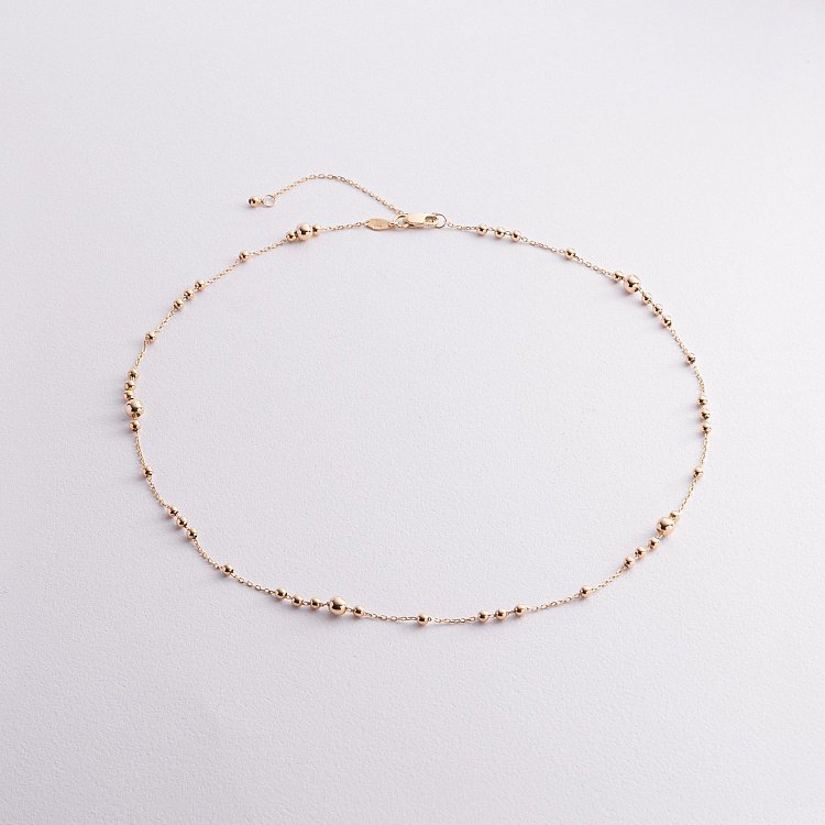 Кольє "Кульки" у жовтому золоті кол02592 від ювелірного магазину Онікс