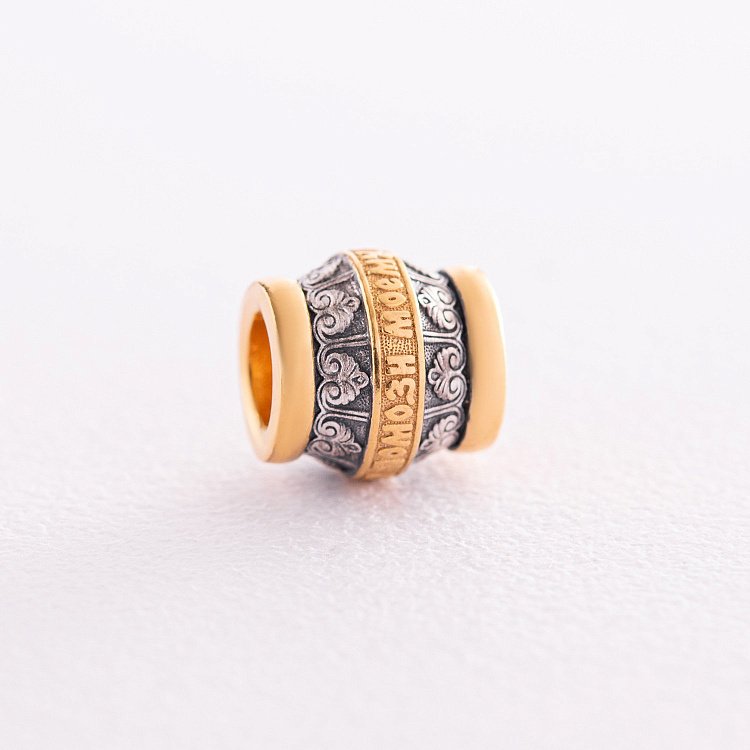 Срібний шарм з позолотою 132295 від ювелірного магазину Онікс