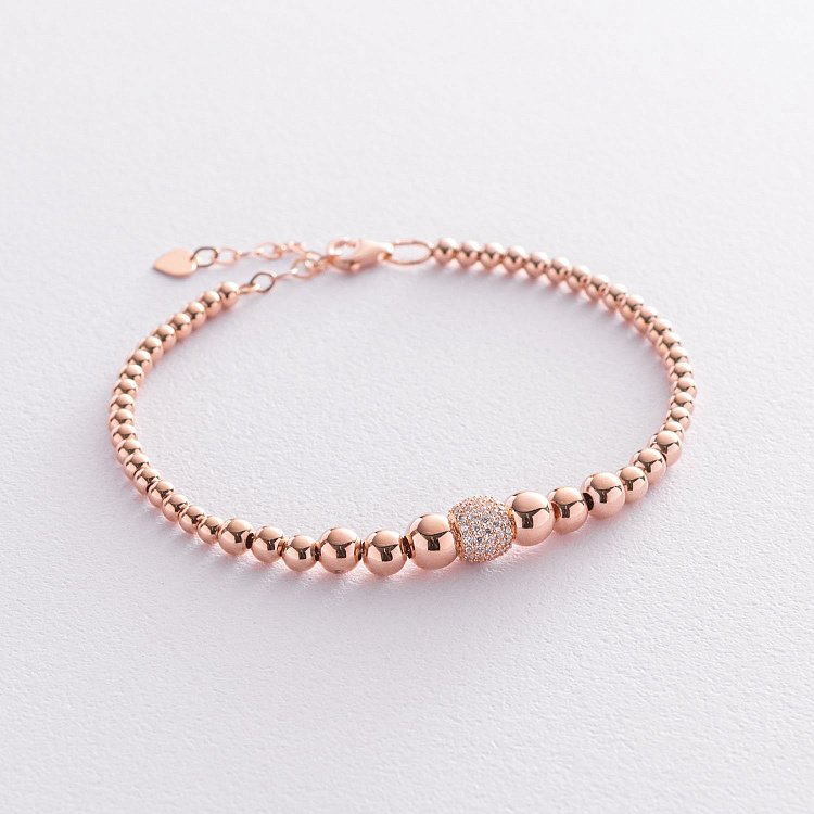 Браслет "Кульки" в червоному золоті (фіаніти) б04697 від ювелірного магазину Онікс