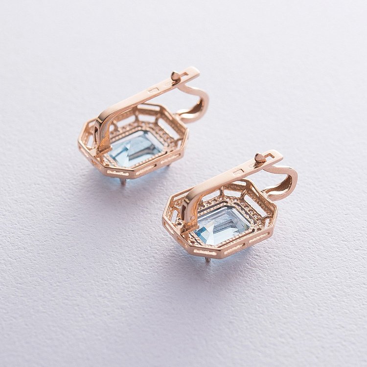 Сережки золоті з блакитним топазом і фіанітами с03117 від ювелірного магазину Онікс - 2