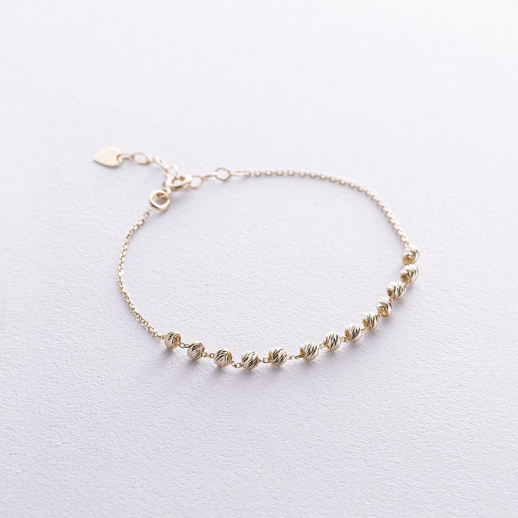 Браслет "Кульки" у жовтому золоті б05350 від ювелірного магазину Онікс