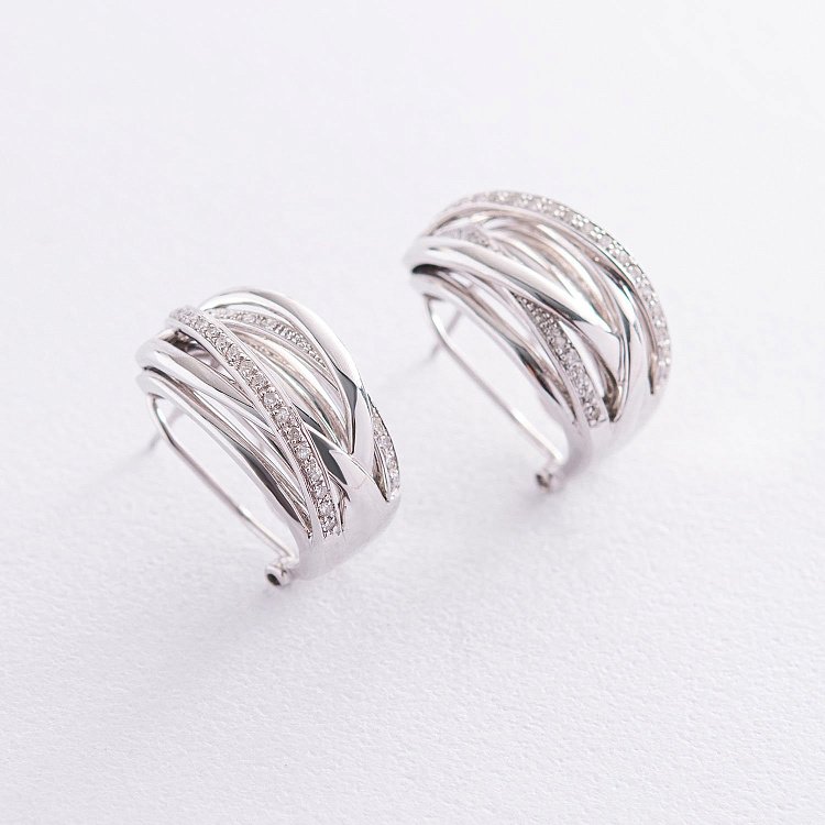 Золоті сережки з діамантами с1555 від ювелірного магазину Онікс