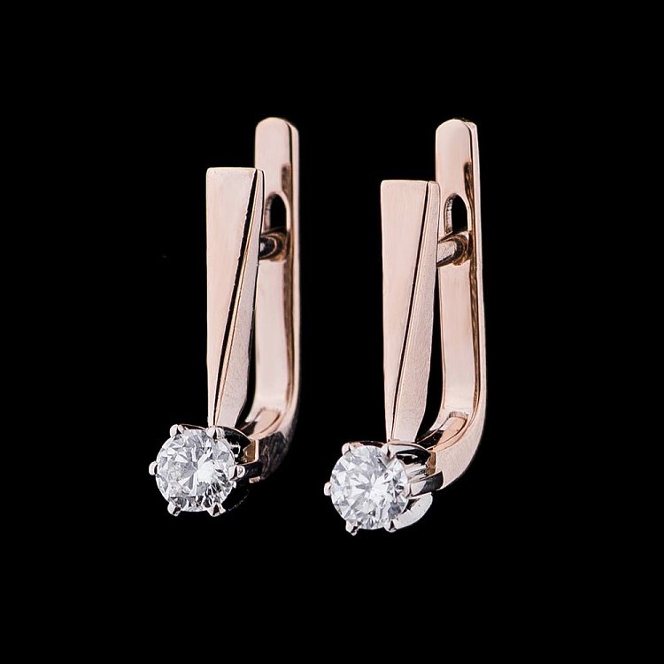 Золоті сережки з діамантами е0462к від ювелірного магазину Онікс