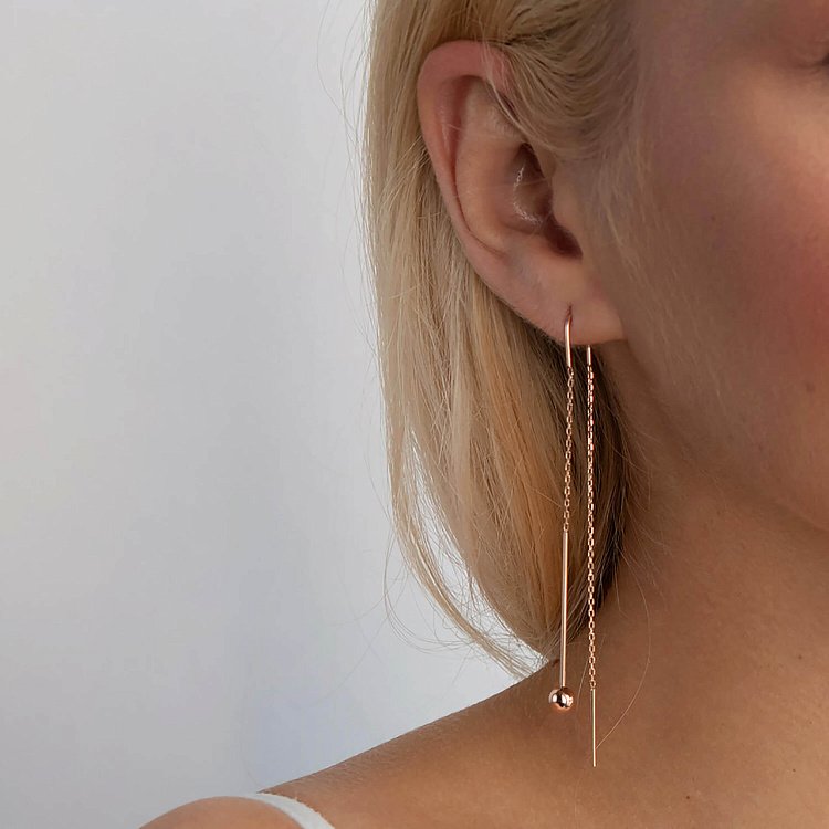 Золоті сережки "Кульки" на ланцюжку с07601 від ювелірного магазину Онікс