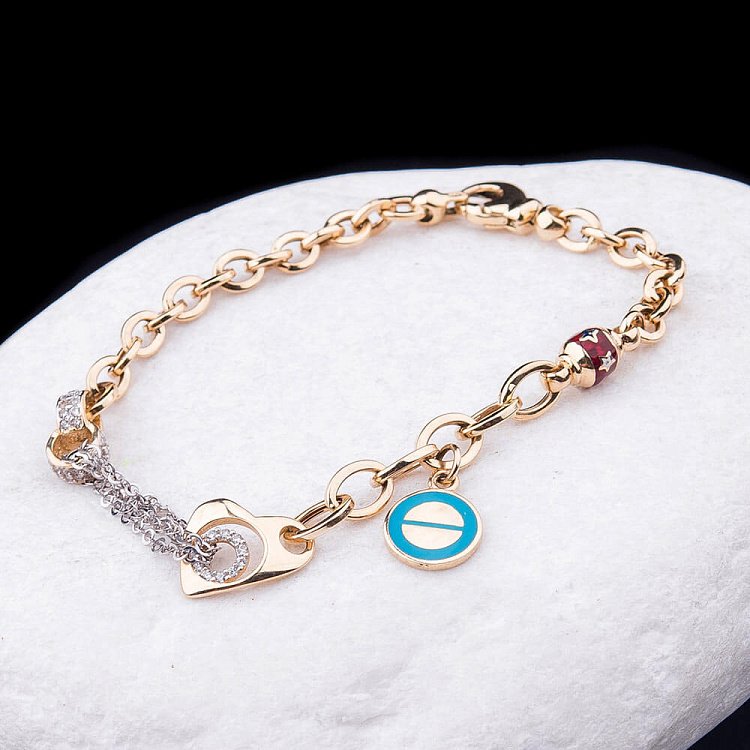 Золотой браслет с эмалью и фианитами б02227 от ювелирного магазина Оникс