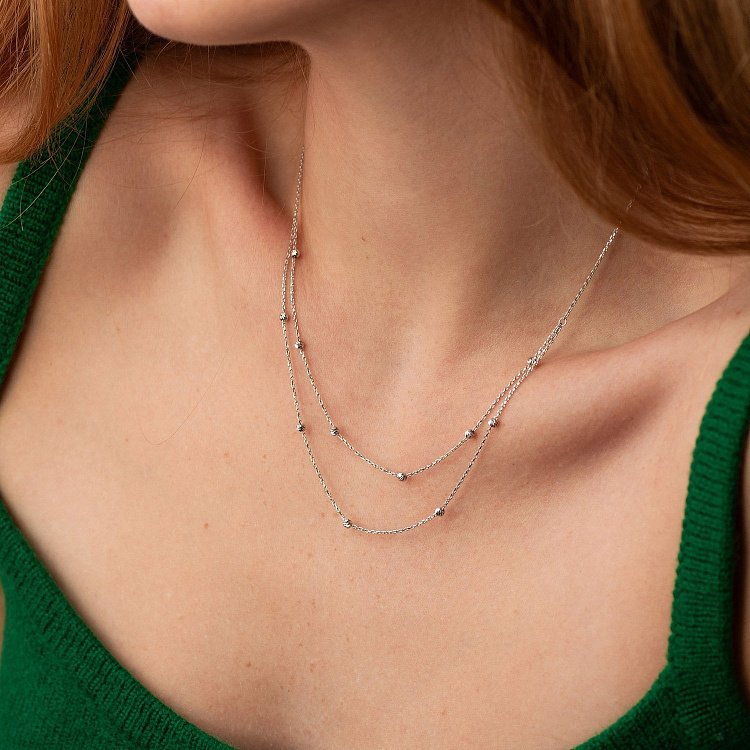 Двойное колье "Шарики" в белом золоте кол02454 от ювелирного магазина Оникс - 1