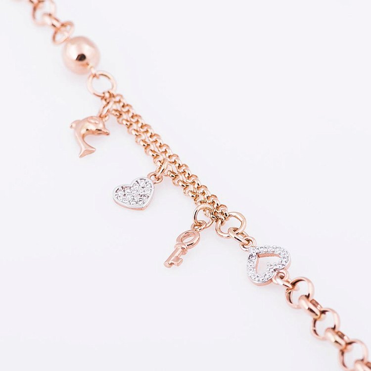 Жіночий золотий браслет з дельфінчиком, сердечком і ключиком б02803 від ювелірного магазину Онікс - 2