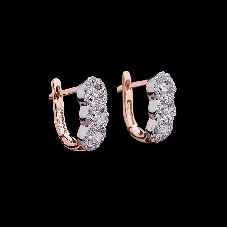 Золоті сережки з фіанітами с04119 від ювелірного магазину Онікс