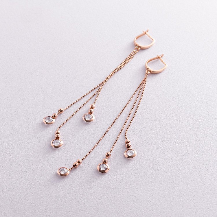 Золоті сережки з фіанітами с04567 від ювелірного магазину Онікс