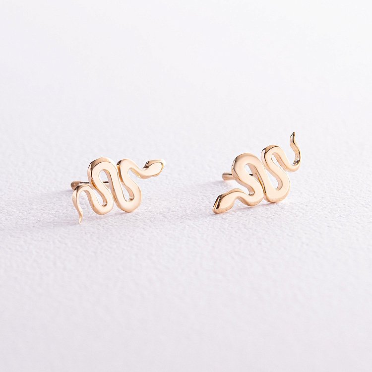 Серьги - пусеты "Змеи" в желтом золоте с07975 от ювелирного магазина Оникс