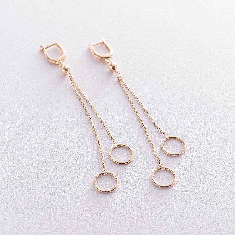 Золотые серьги "Круговорот на цепочке" с07310 от ювелирного магазина Оникс