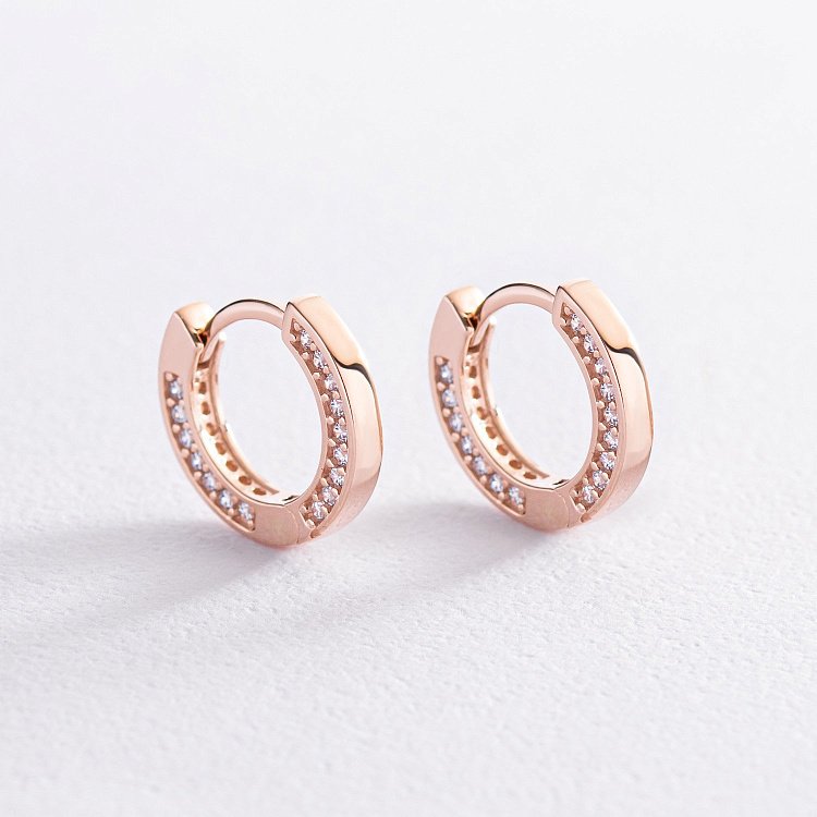 Золоті сережки - кільця з фіанітами с07800 від ювелірного магазину Онікс