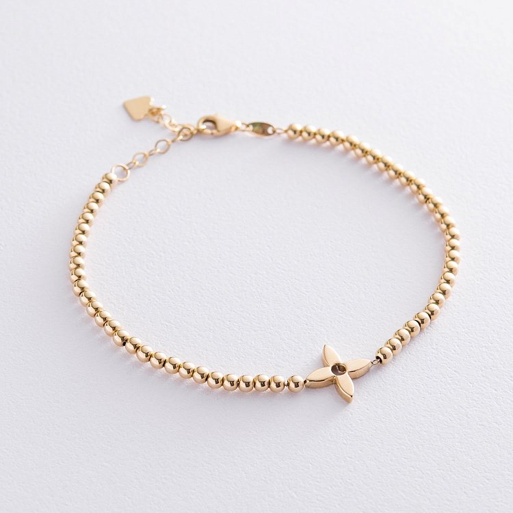 Кульковий браслет "Конюшина" в жовтому золоті б04436 від ювелірного магазину Онікс