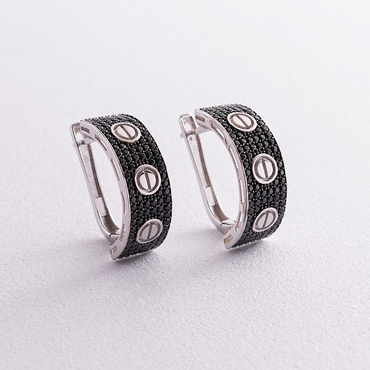 Золоті сережки "Love" з фіанітами с04935 від ювелірного магазину Онікс