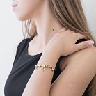 Ексклюзивний золотий браслет з серцями і кулею б02220 от ювелирного магазина Оникс