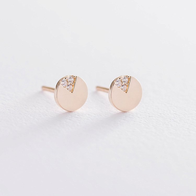 Золоті сережки-пусети з фіанітами с06765 від ювелірного магазину Онікс