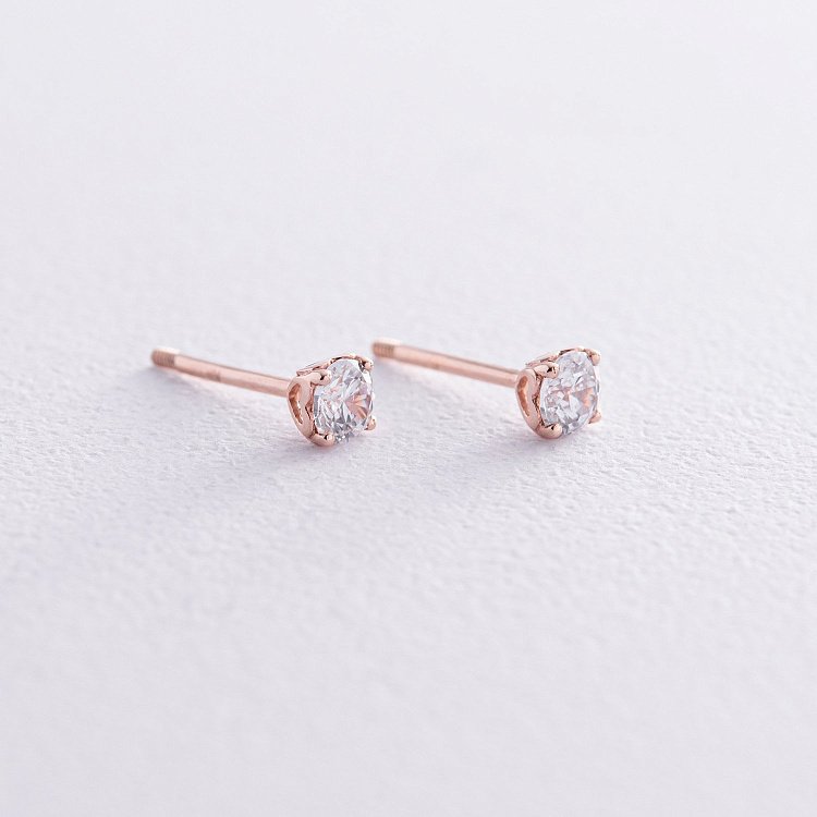 Сережки - пусети "Сердечки" у червоному золоті (фіаніти) с06034 від ювелірного магазину Онікс