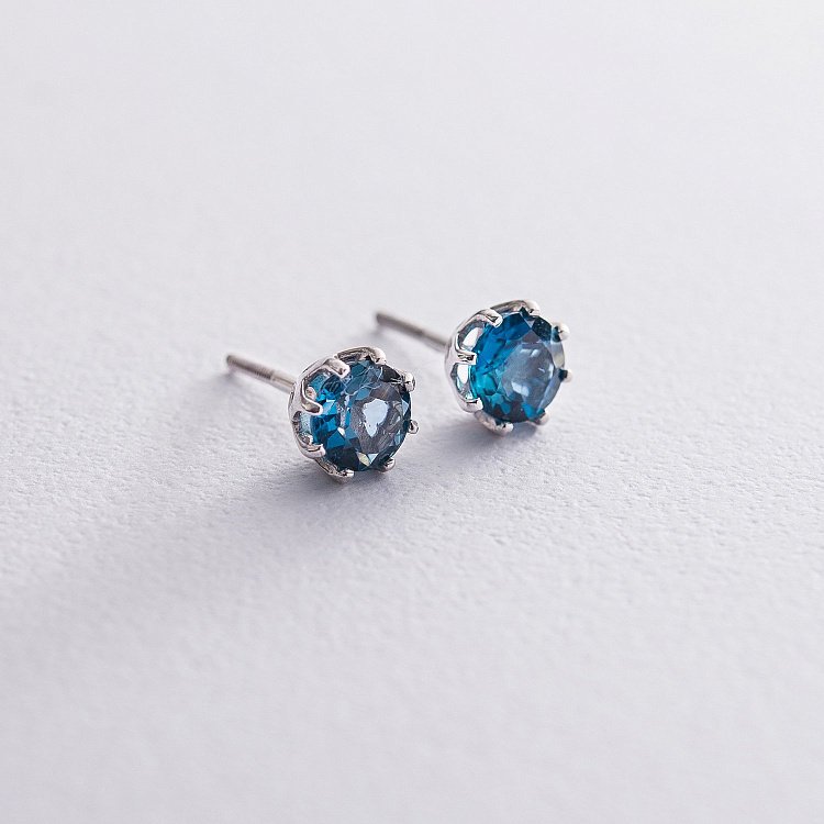 Золотые серьги - пусеты (топаз Лондон Блю) с06674 от ювелирного магазина Оникс