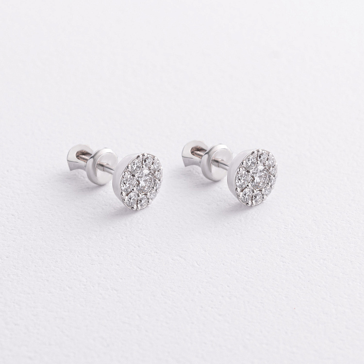 Золоті сережки - пусети з діамантами 344901121 від ювелірного магазину Онікс