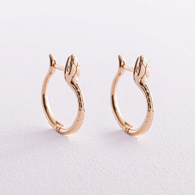 Серьги "Змеи" в желтом золоте с08030 от ювелирного магазина Оникс