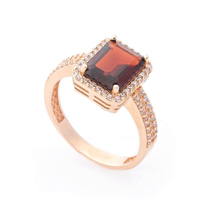 Золота каблучка з піропом (гранатом) і фіанітами к04638 від ювелірного магазину Онікс