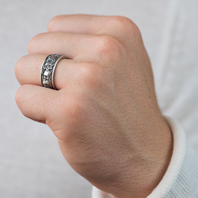 Чоловічий срібний перстень з черепами 7123 від ювелірного магазину Онікс - 1