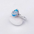 Золотое кольцо с голубым топазом и бриллиантами к502 от ювелирного магазина Оникс