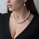 Золоті сережки-пусети (кіаніт, перлина, діамант) сб0260tk от ювелирного магазина Оникс - 4