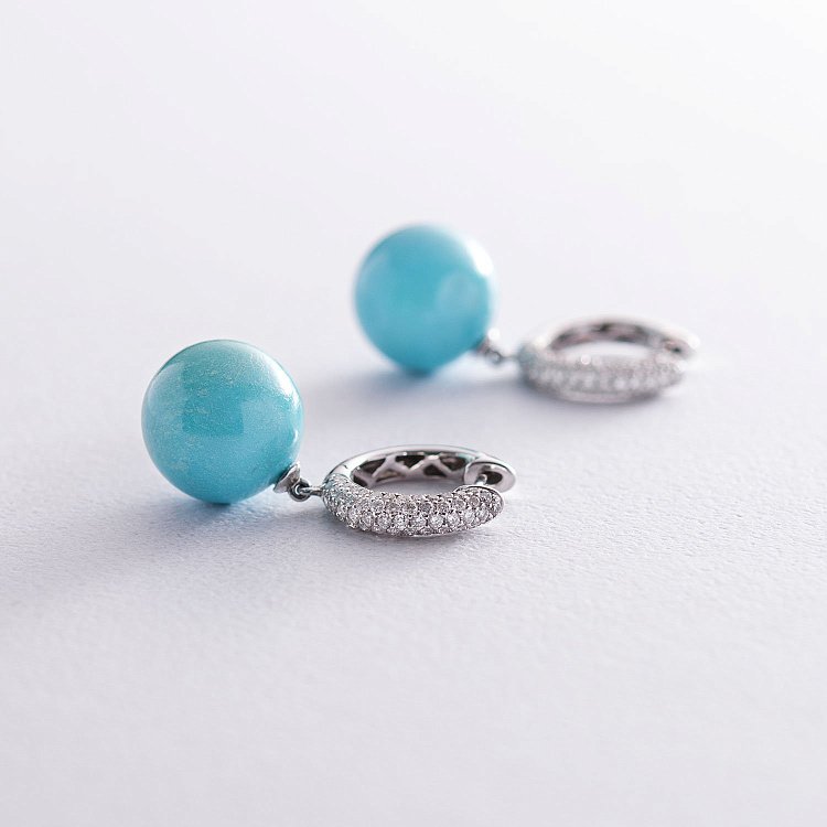 Золотые серьги "Шарики" с бриллиантами и бирюзой ME34304ca от ювелирного магазина Оникс