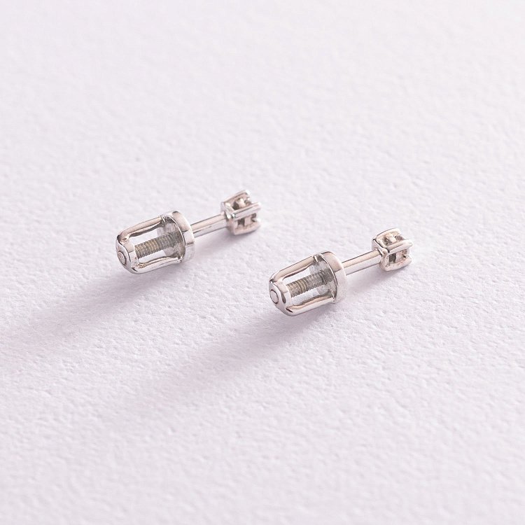 Золоті сережки - пус﻿ети з діамантами 102-10025 від ювелірного магазину Онікс