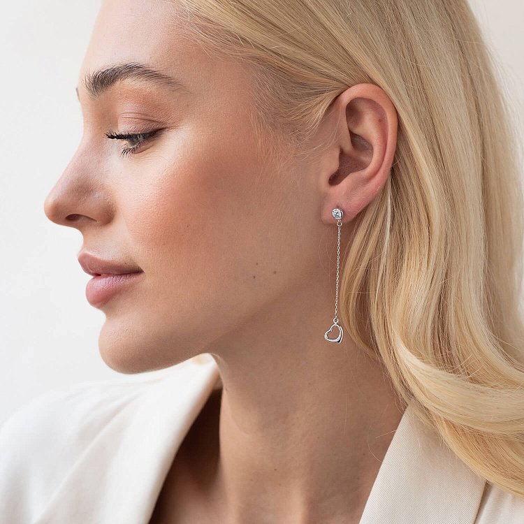 Золотые серьги "Сердечки" на цепочке (фианиты) с07705 от ювелирного магазина Оникс