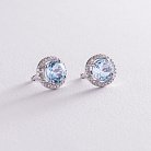 Серебряные серьги с голубыми топазами и фианитами 121351 от ювелирного магазина Оникс