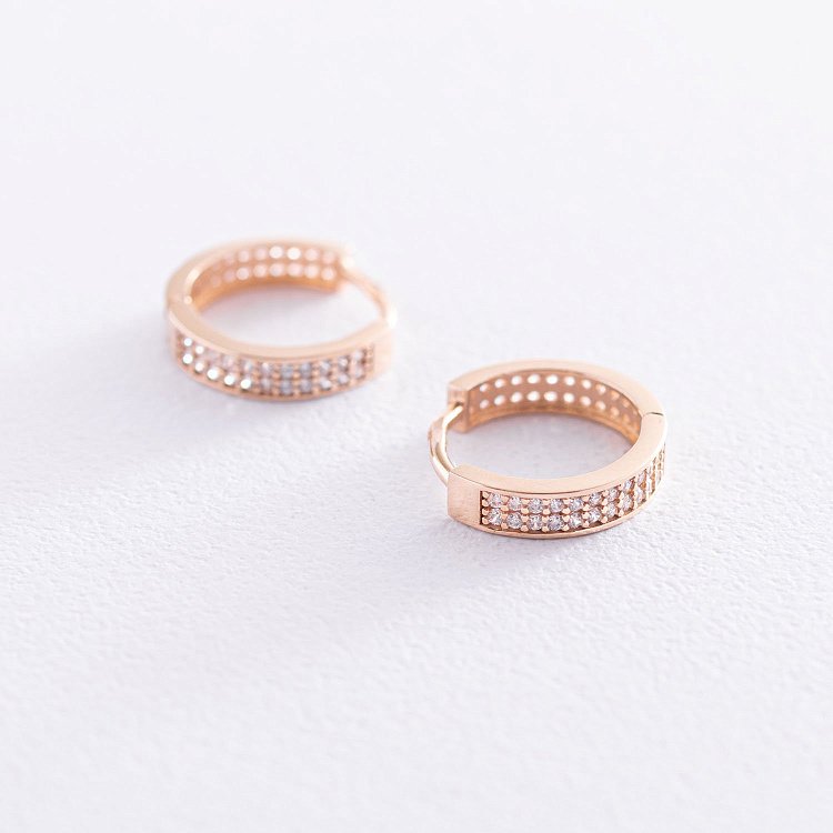 Золотые серьги - кольца с фианитами с06554 от ювелирного магазина Оникс