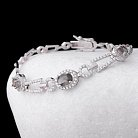 Родированный браслет (синтетическая шпинель, фианиты) б02 от ювелирного магазина Оникс - 1