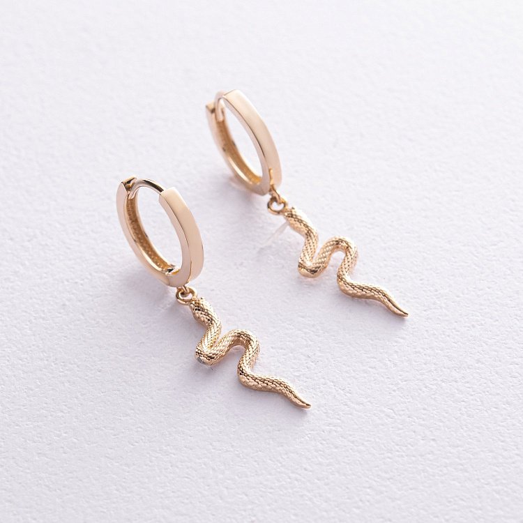 Серьги - кольца "Змеи" в желтом золоте с08022 от ювелирного магазина Оникс