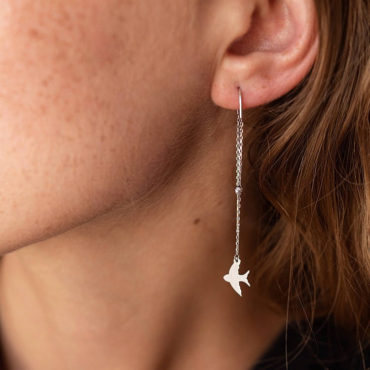 Сережки - протяжки "Ластівки" у білому золоті с08046 від ювелірного магазину Онікс - 1