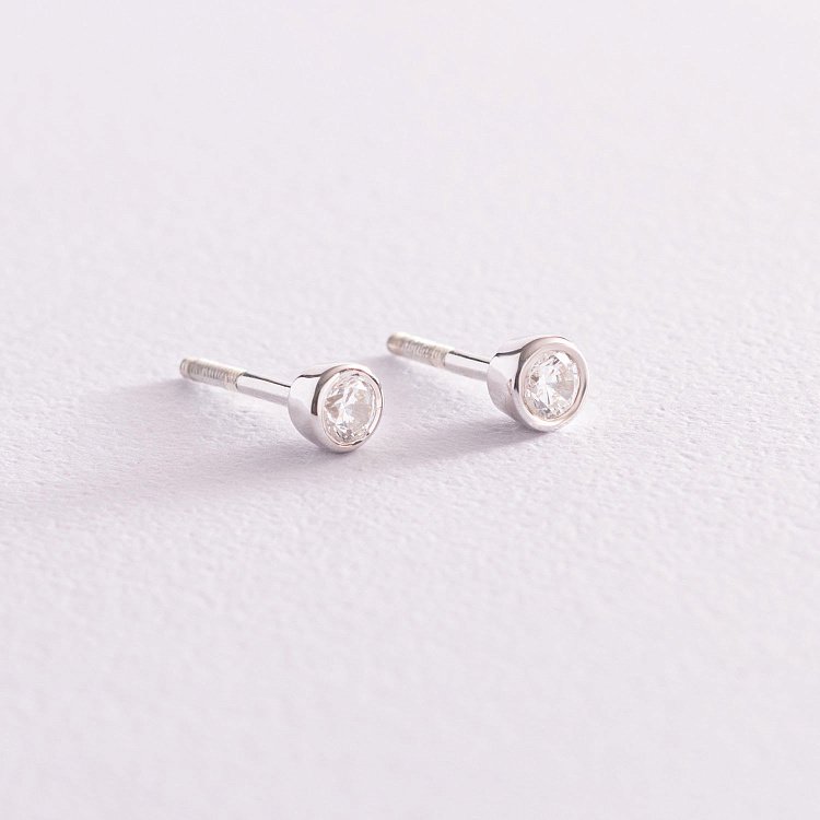 Золоті сережки - пусети з діамантами 102-10010(3.4) від ювелірного магазину Онікс