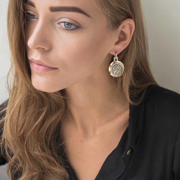 Золоті сережки з фіанітами с03724 від ювелірного магазину Онікс