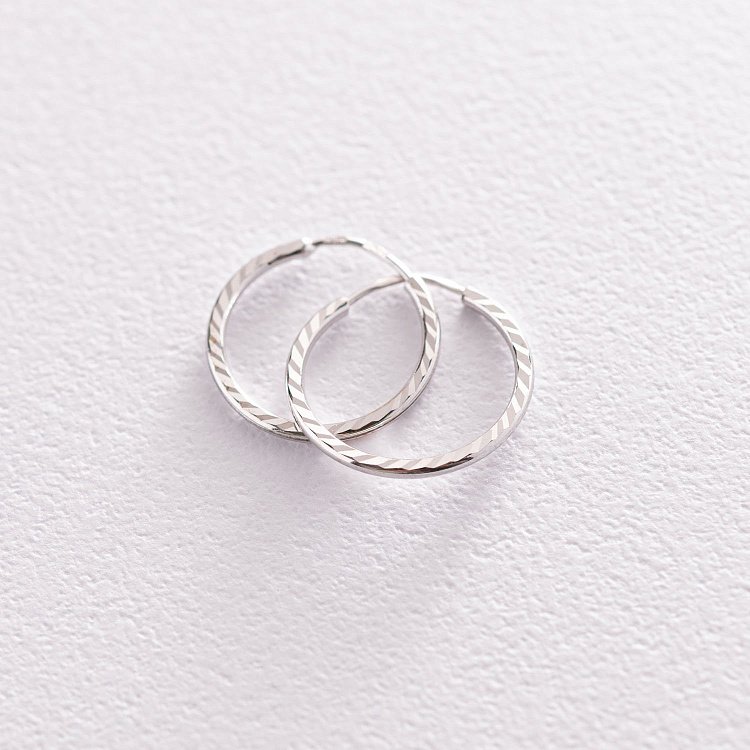 Сережки - кільця в білому золоті (1.5 см) с07152 від ювелірного магазину Онікс