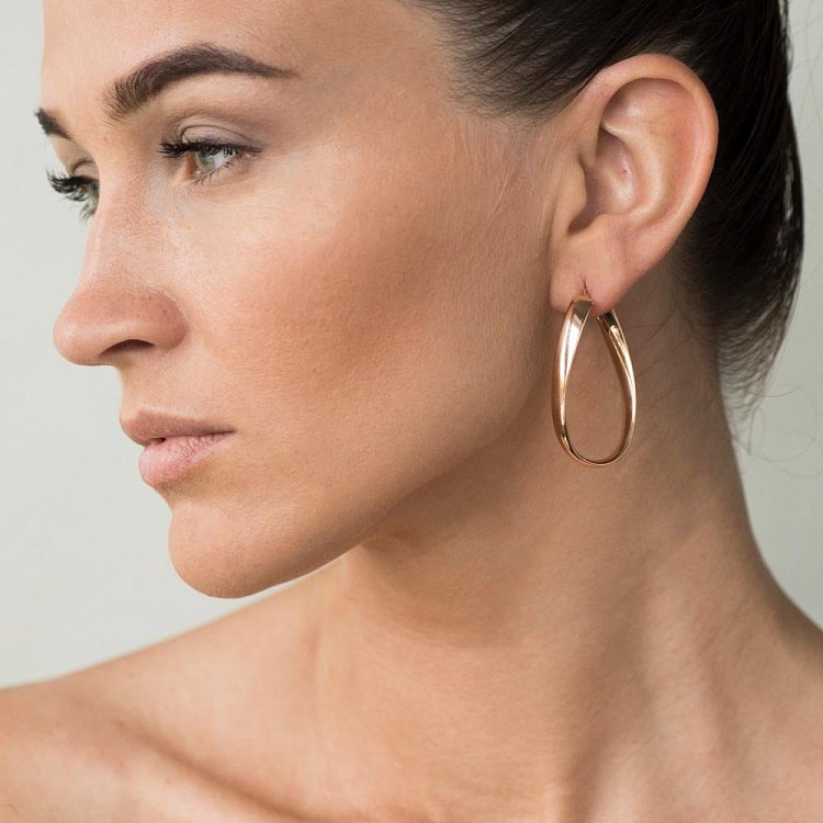 Золоті сережки без каменів с01150 від ювелірного магазину Онікс