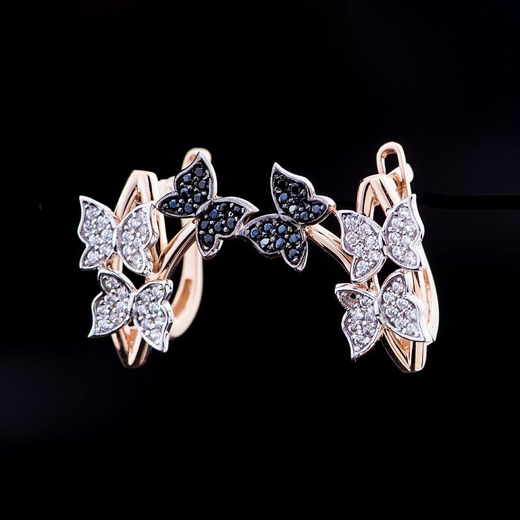 Золоті сережки "Метелики" з фіанітами с04618 від ювелірного магазину Онікс