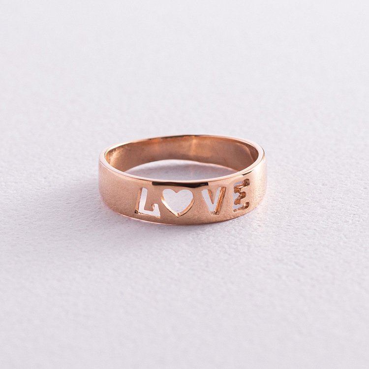 Золота каблучка "Love" к04879 Золота каблучка "Love" к04879 від ювелірного магазину Онікс