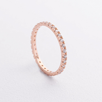 Каблучка з доріжкою каменів в червоному золоті к08277