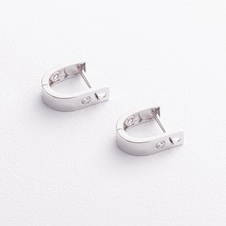 Золотые серьги "Love" с фианитами с09705 от ювелирного магазина Оникс - 1