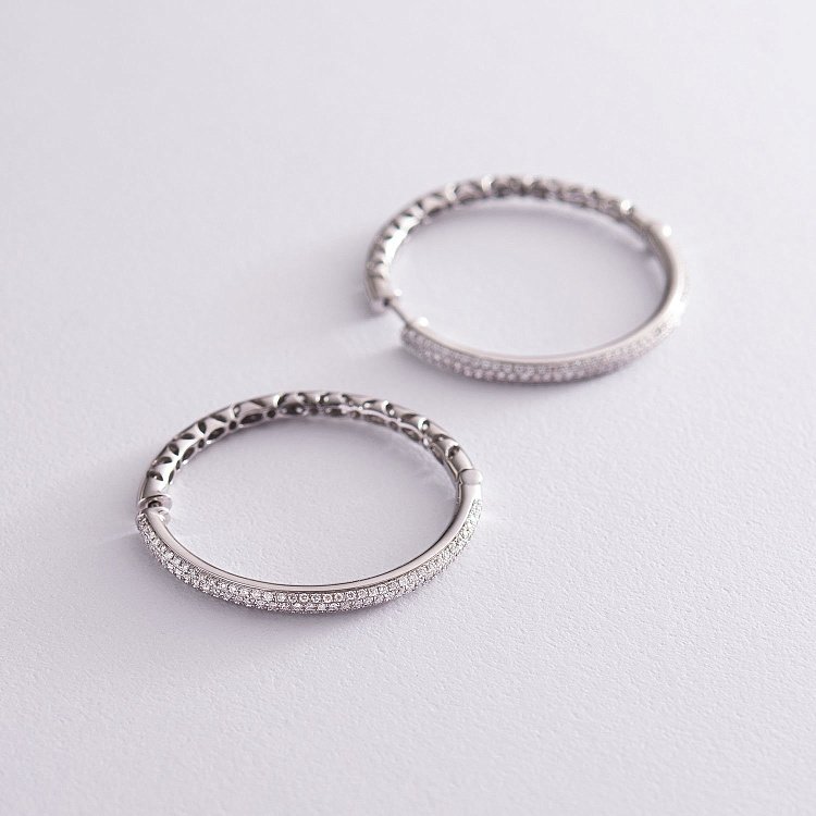 Золоті сережки - кільця з діамантами с1117 від ювелірного магазину Онікс