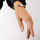 Жесткий браслет "Змея" в желтом золоте б05457 от ювелирного магазина Оникс - 1