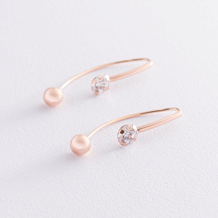 Золотые серьги "Вдохновение" с фианитами с06190 от ювелирного магазина Оникс