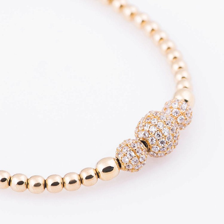 Золотой браслет "Шарики" с фианитами б02684 от ювелирного магазина Оникс